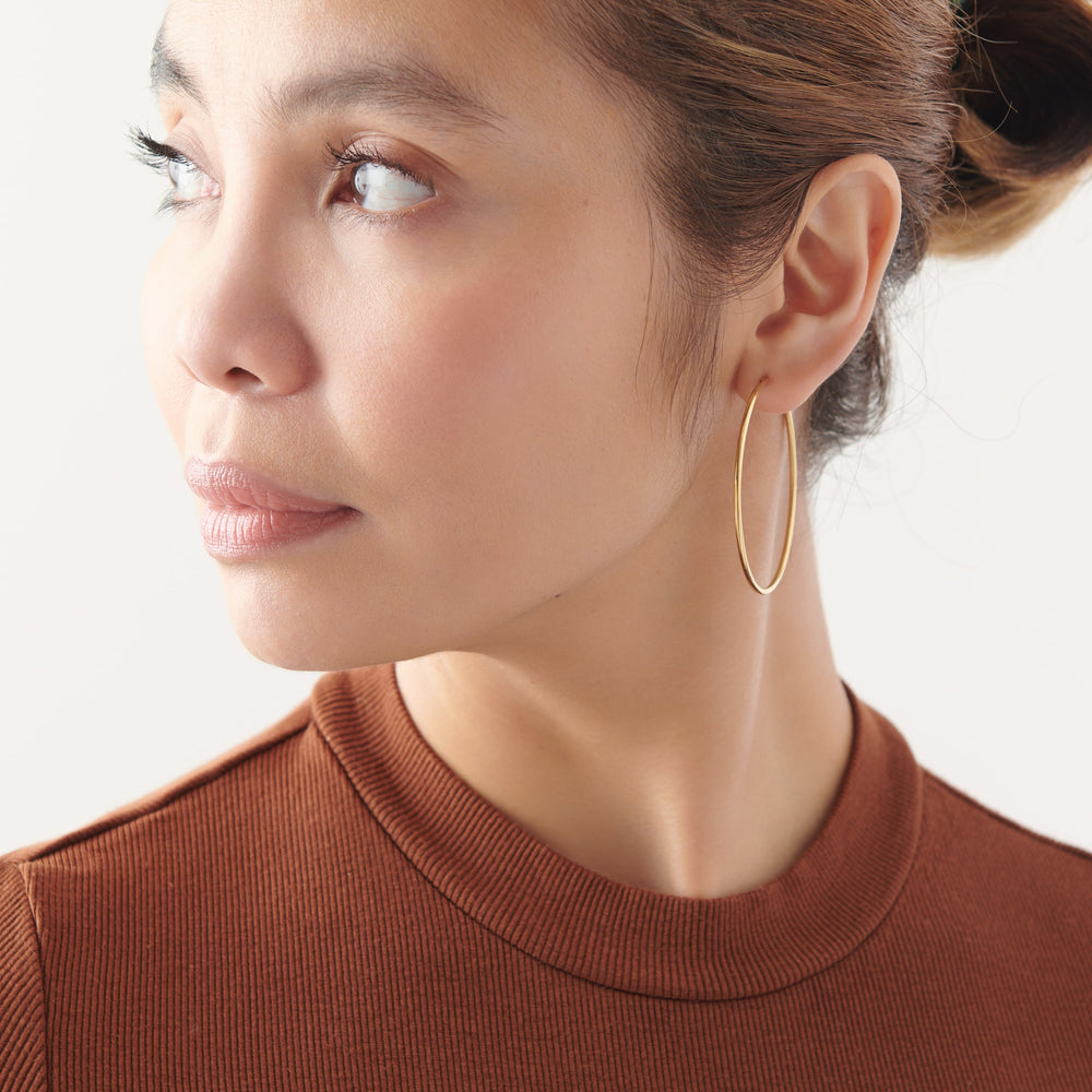 Vintage Sparrow Jewelry Gold Hoops Earrings on model