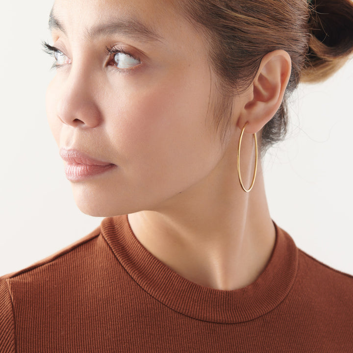 Vintage Sparrow Jewelry Gold Hoops Earrings on model