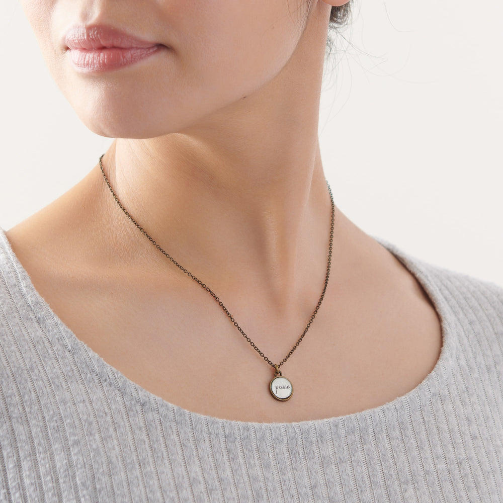 Vintage Sparrow Peace Classic Design Necklace on model