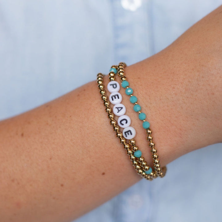 Vintage Sparrow Peace Stack Bracelet on model